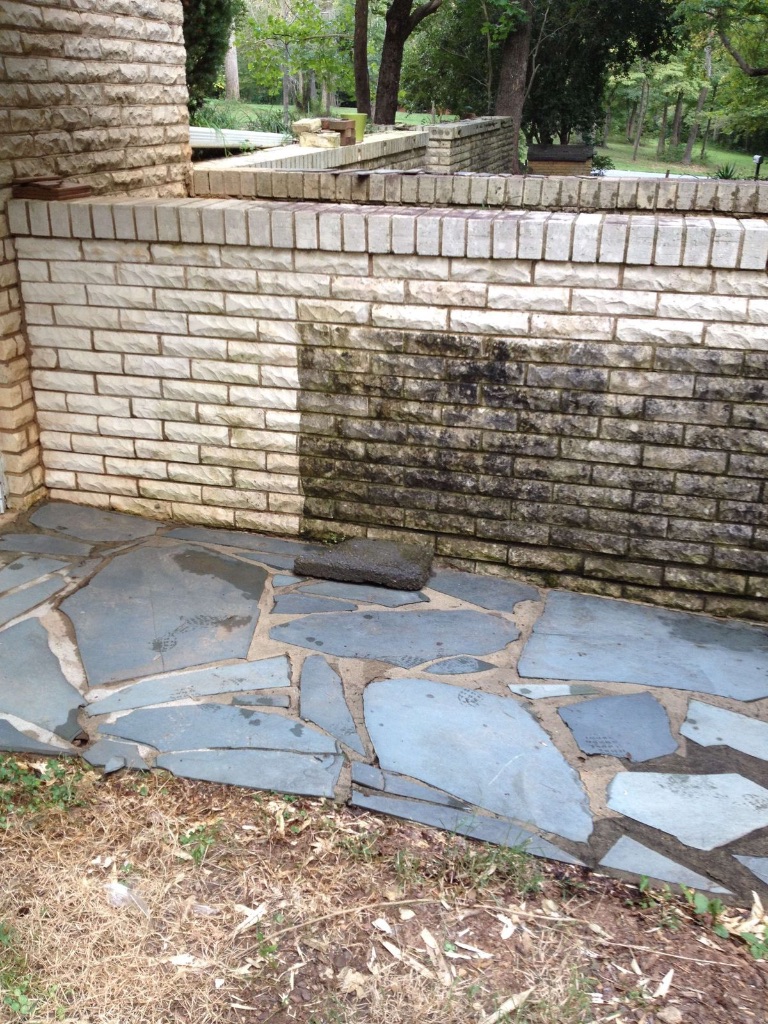 Stone Wall Transformation - Before and After Pressure Washing